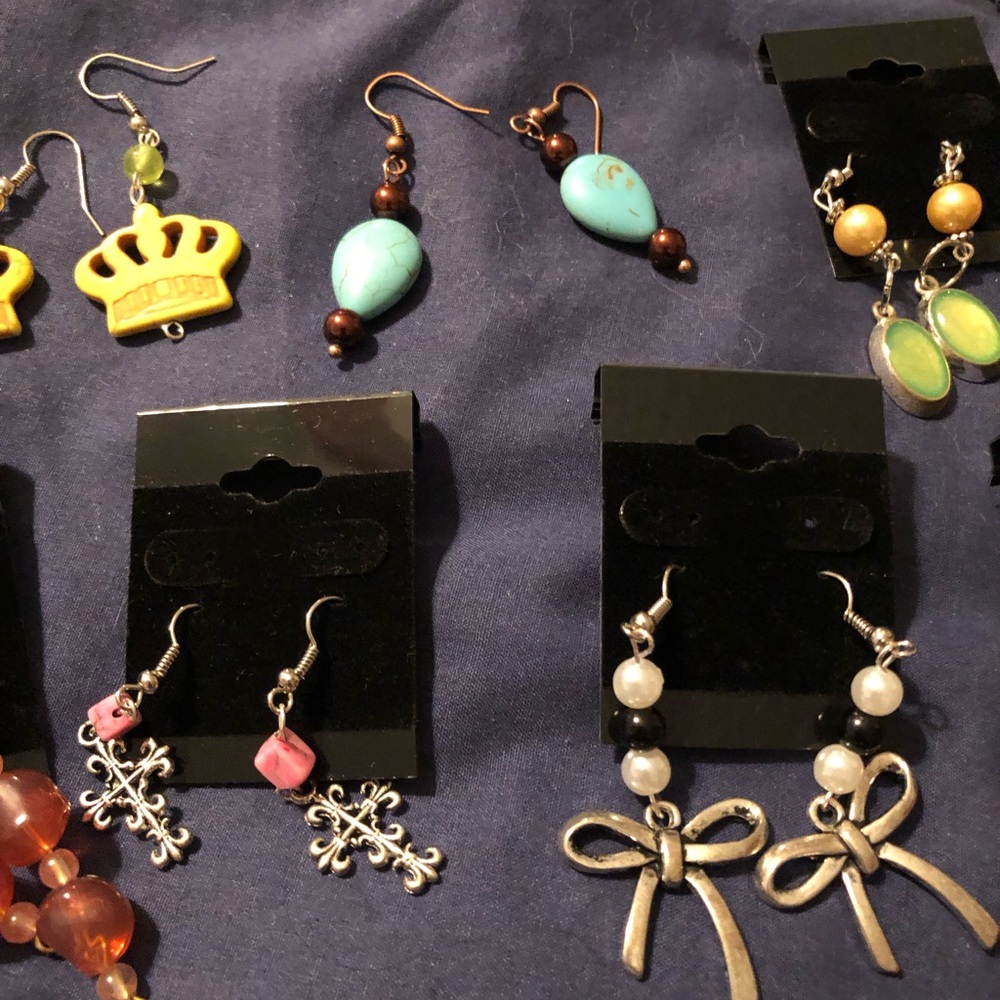 Lot of 15 pair of handmade earrings and one European style bracelet.